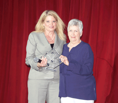 Holmes lauds alumna Dixie Branch for support of music program