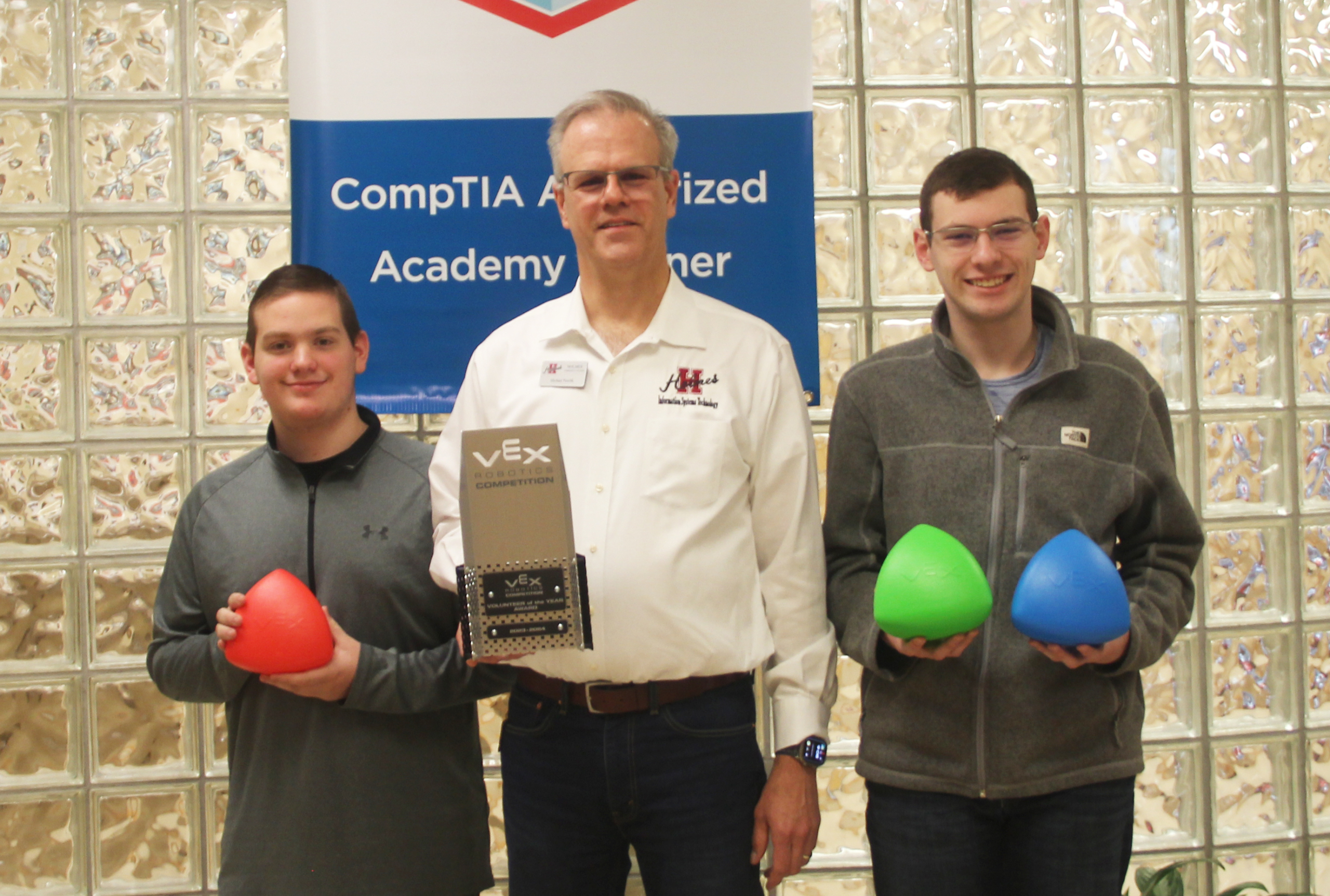 Holmes instructor Michael Pawlik named Vex Robotics Volunteer of the Year