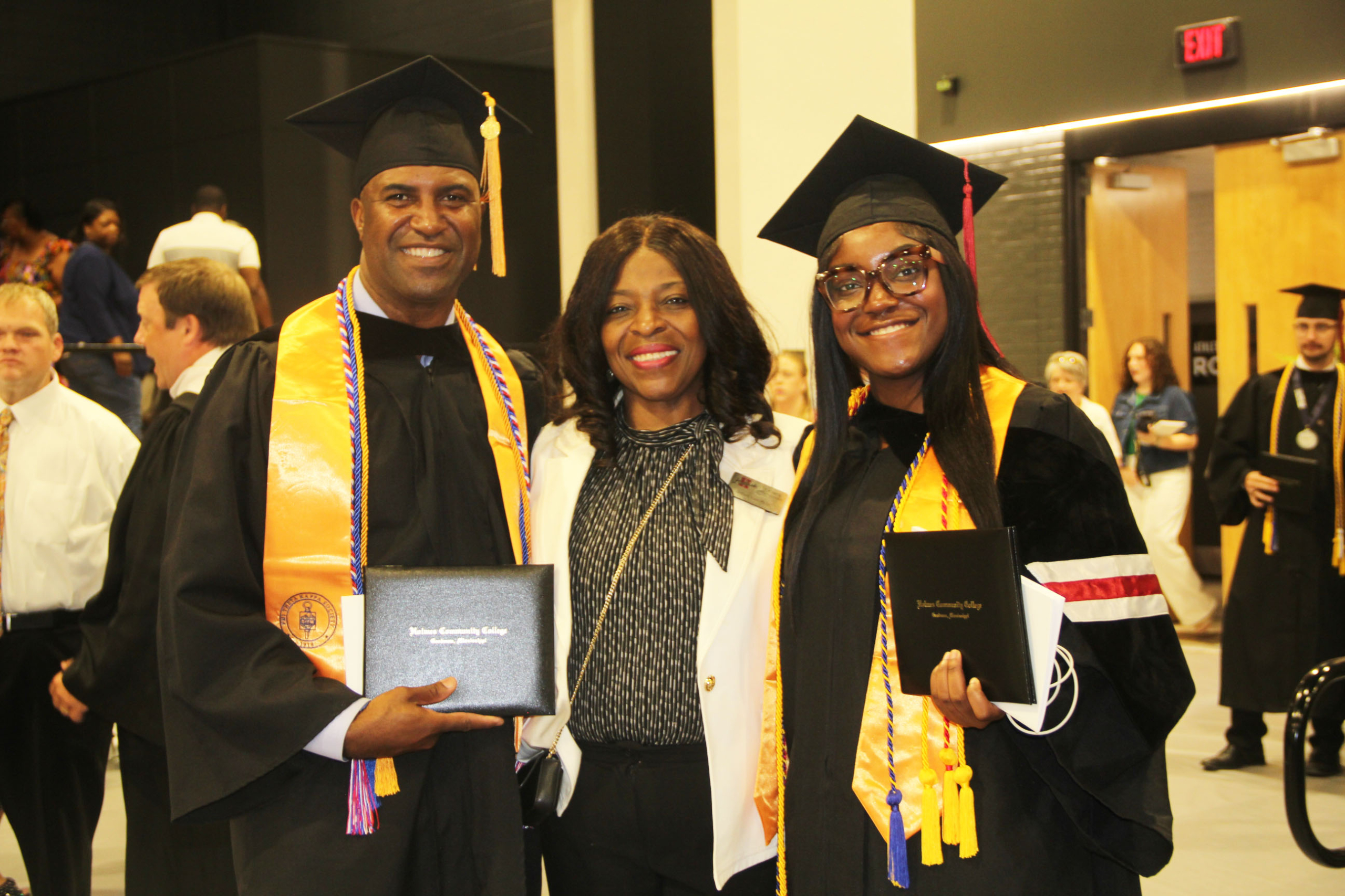 Father, daughter celebrate graduation together at Holmes Community College Father, daughter celebrate graduation together at Holmes Community College